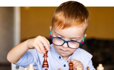 special education student playing chess