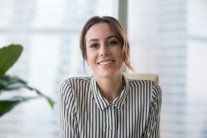 Woman sitting there smiling