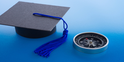 graduation cap and compass
