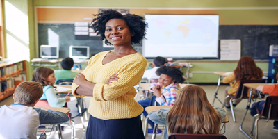 teacher standing in front of classroom