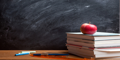 books with apple on top