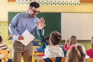 teacher high five student