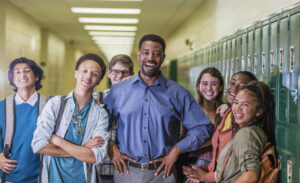 teacher in hallway with students