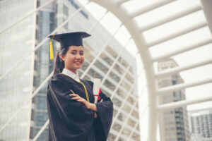 Graduate student with diploma